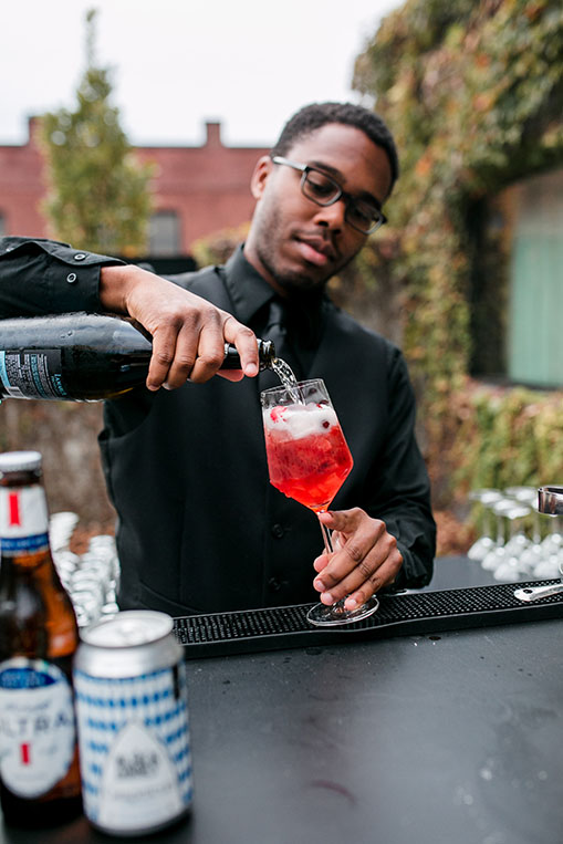 cranberry aperol spritz with rosemary garish