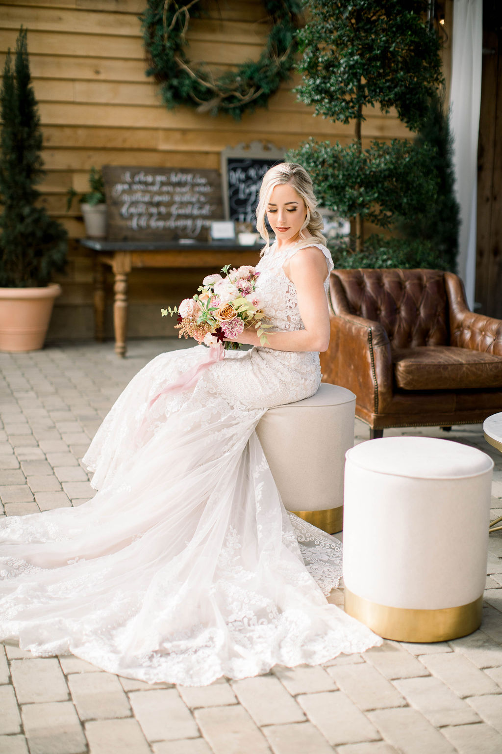 Bride Sitting on Round White Ottoman