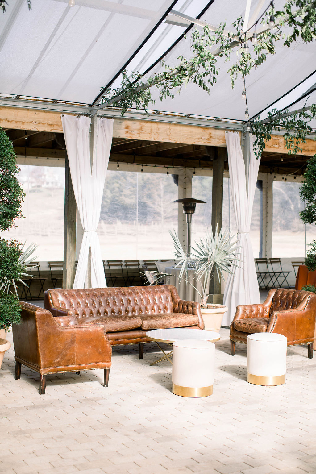 Lounge Area with Brown Leather Seating