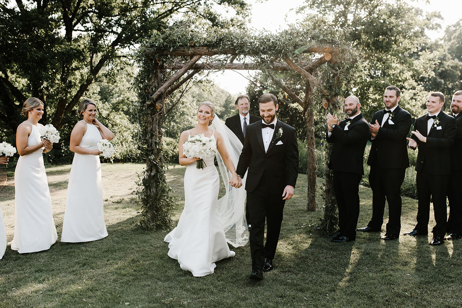 Emily and Chris Walking Down Aisle