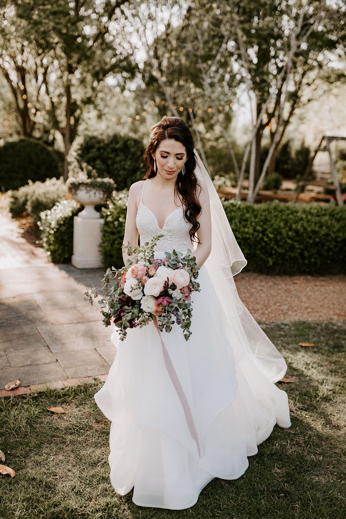 Kristen Holding Romantic Spring Bridal Bouquet