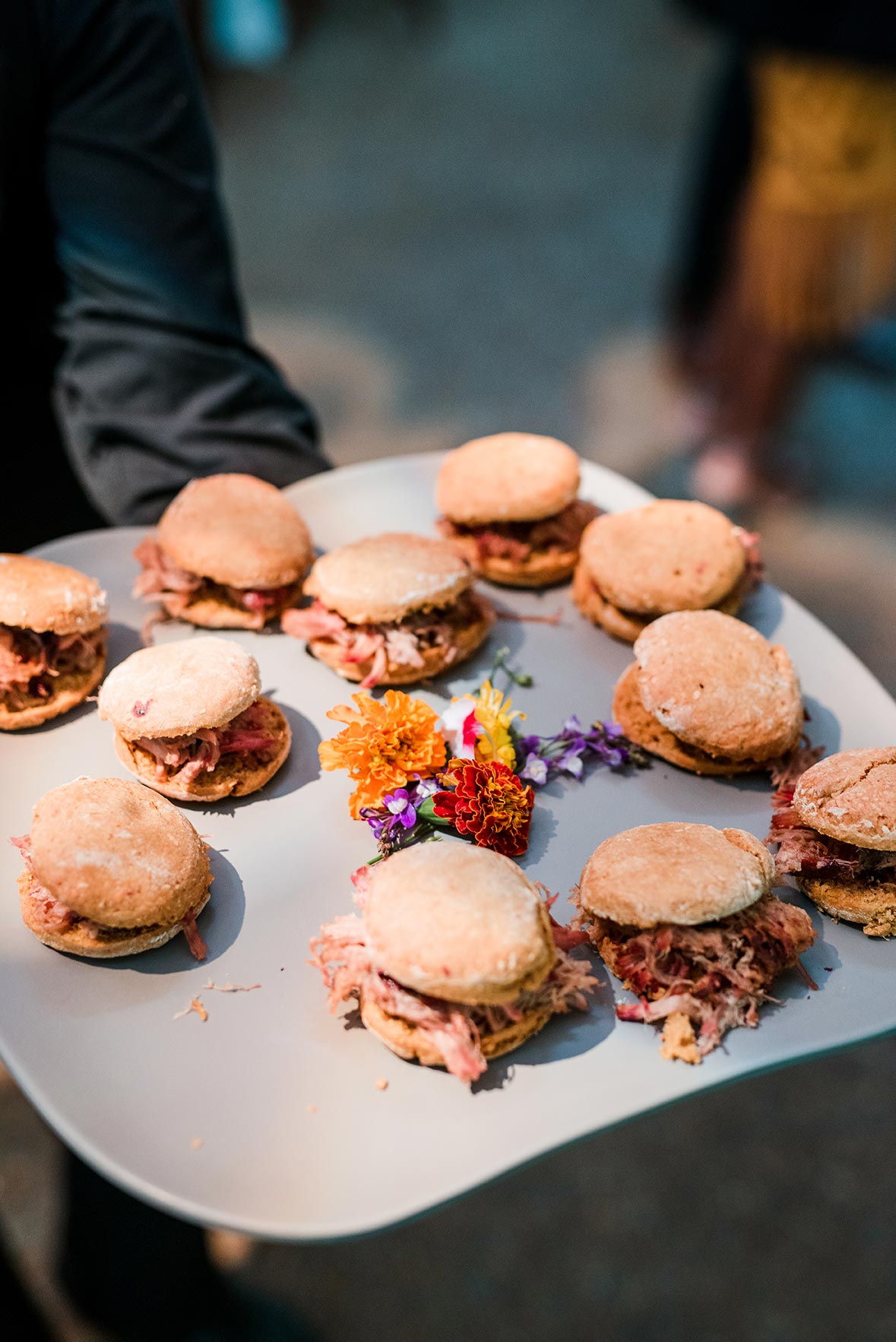 A plate of gourmet Pulled Pork Sliders