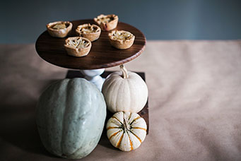 Mini Pies With a Pumpkin and Gourd Display