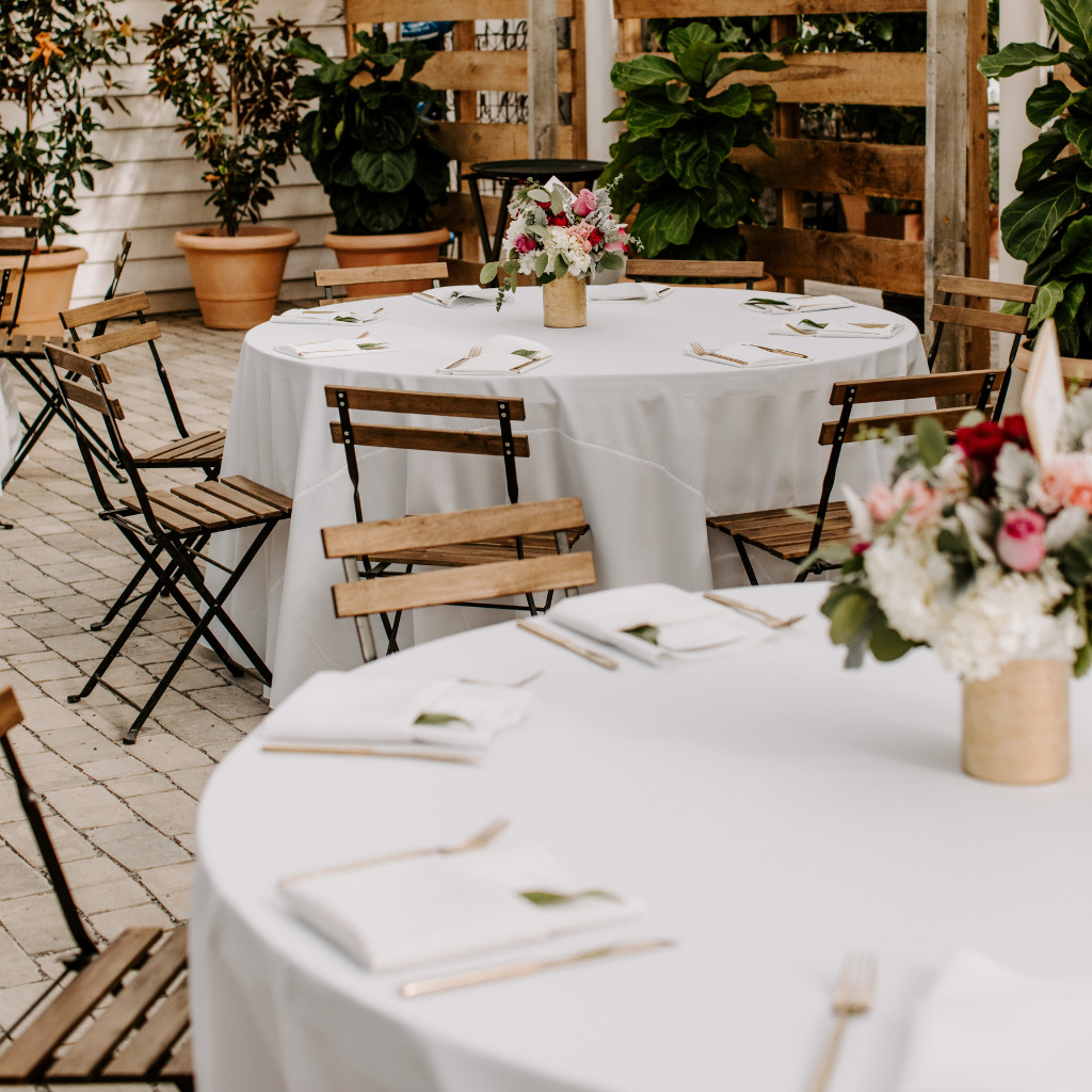 Wedding Reception Place Settings And Chairs