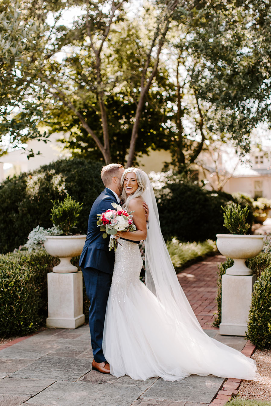 Bride and Groom Posing Outside