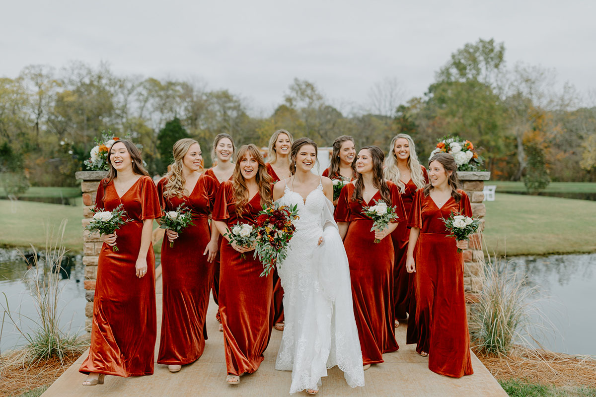 Bride And Bridesmaids Posing With Bouquets