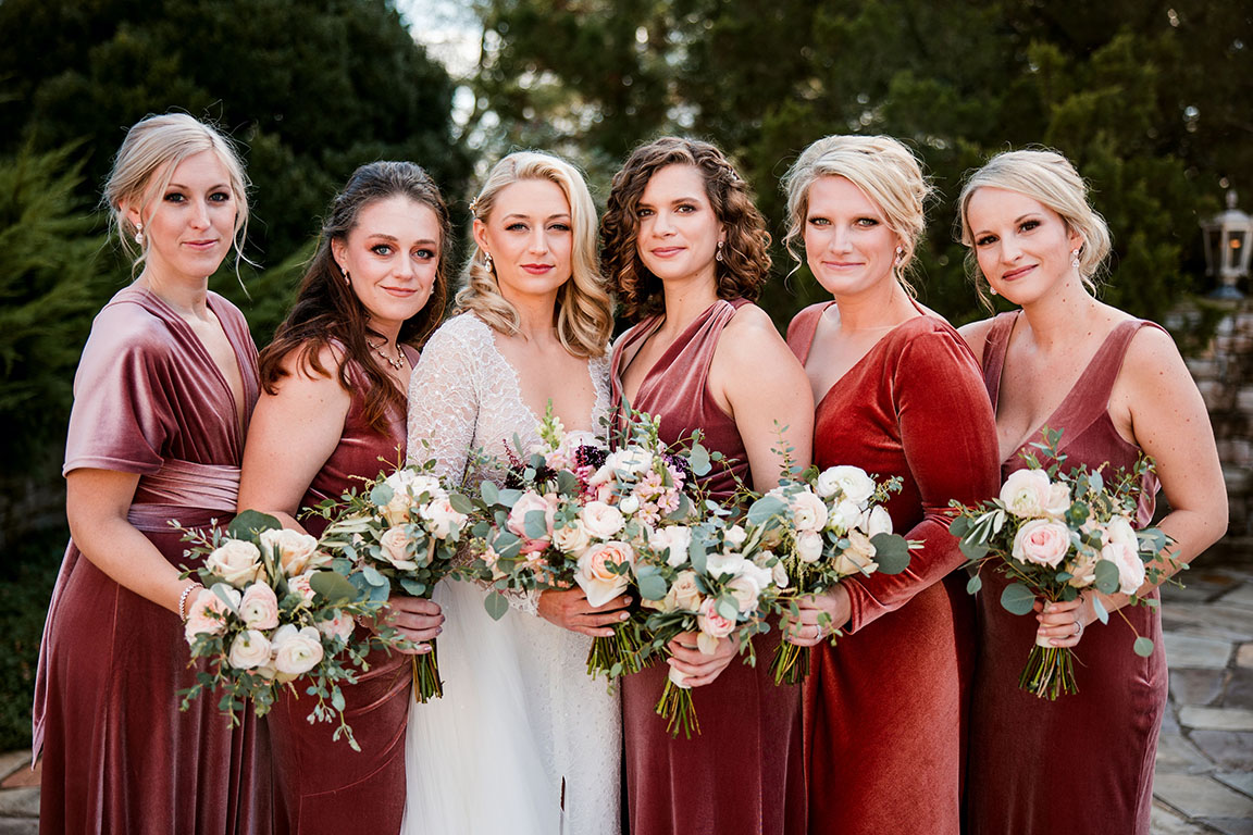 Kera And Her Bridesmaids Holding Bouquets