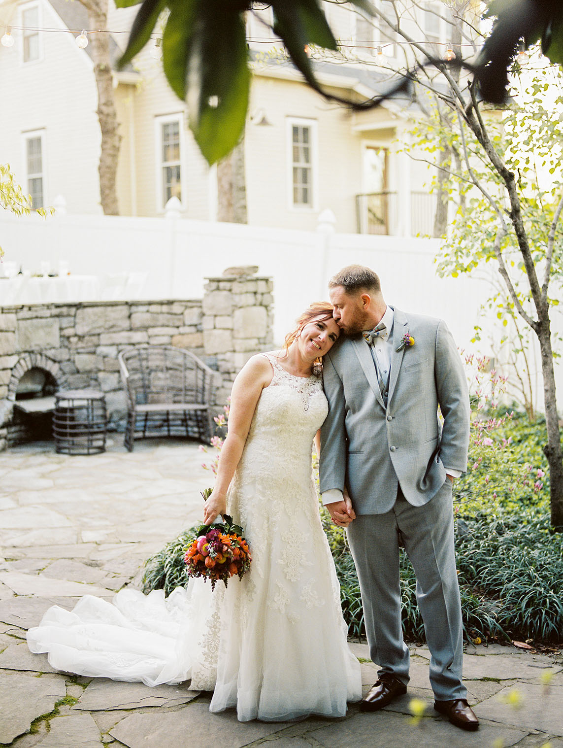 Groom Kissing Bride's Forehead