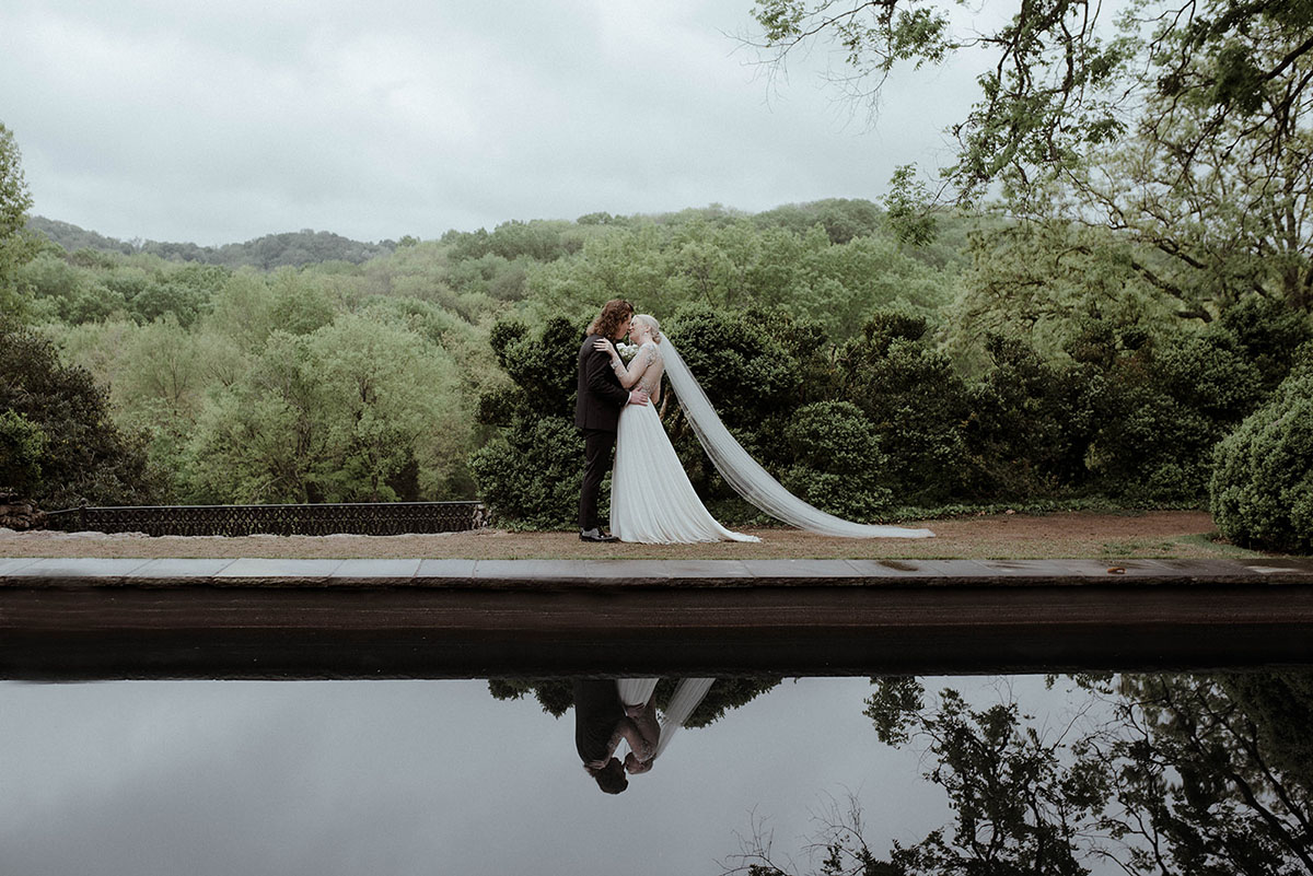 Ashleigh and Davis Kissing During First Look