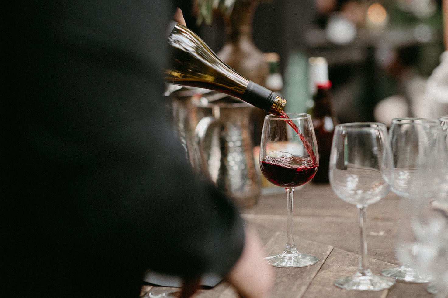 Pouring Red Wine in Glass