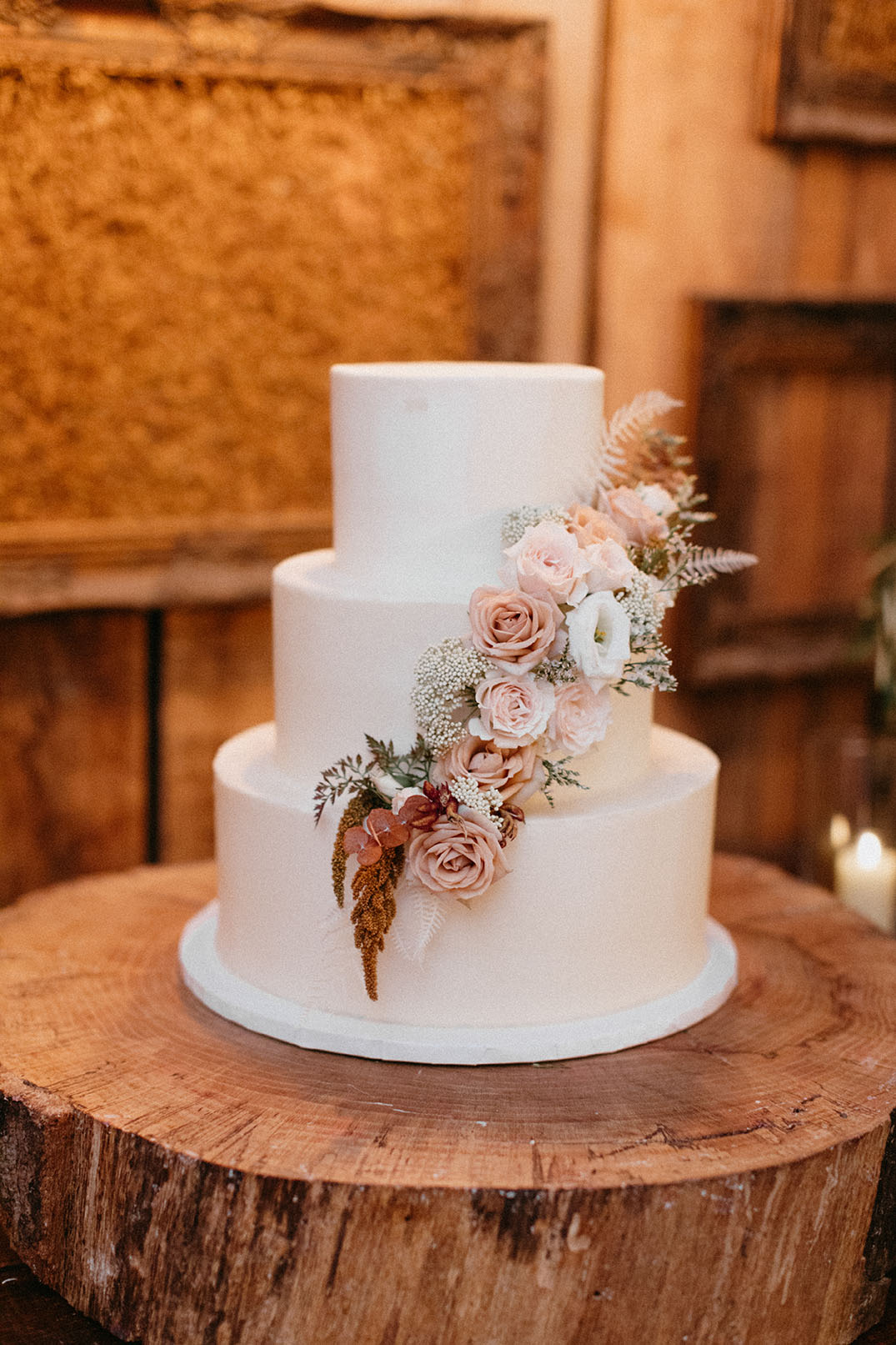 Close-up of Wedding Cake with Floral Decorations