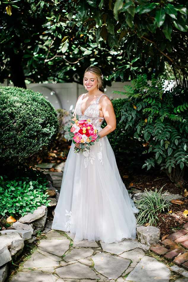 Sydney Holding Colorful Bouquet