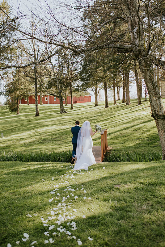 Bride and groom leaving ceremony site