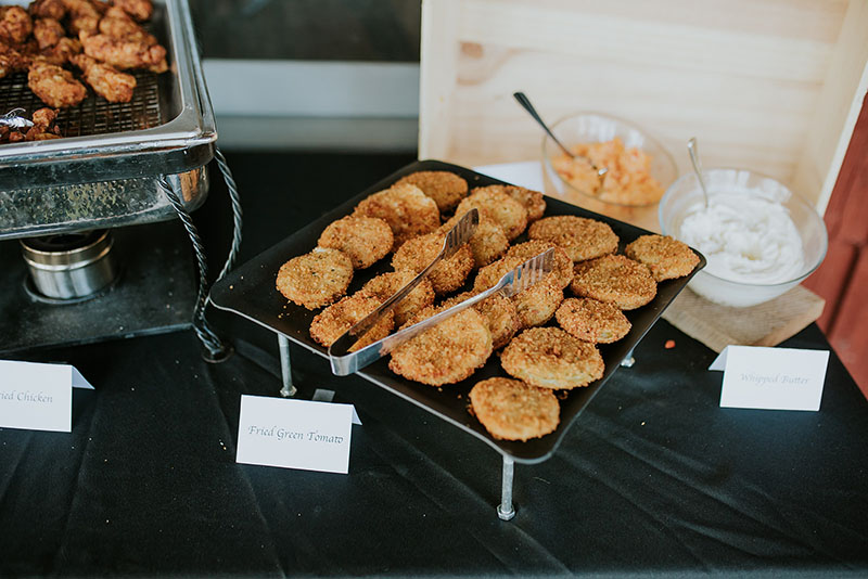 Fried green tomatoes at buffet station