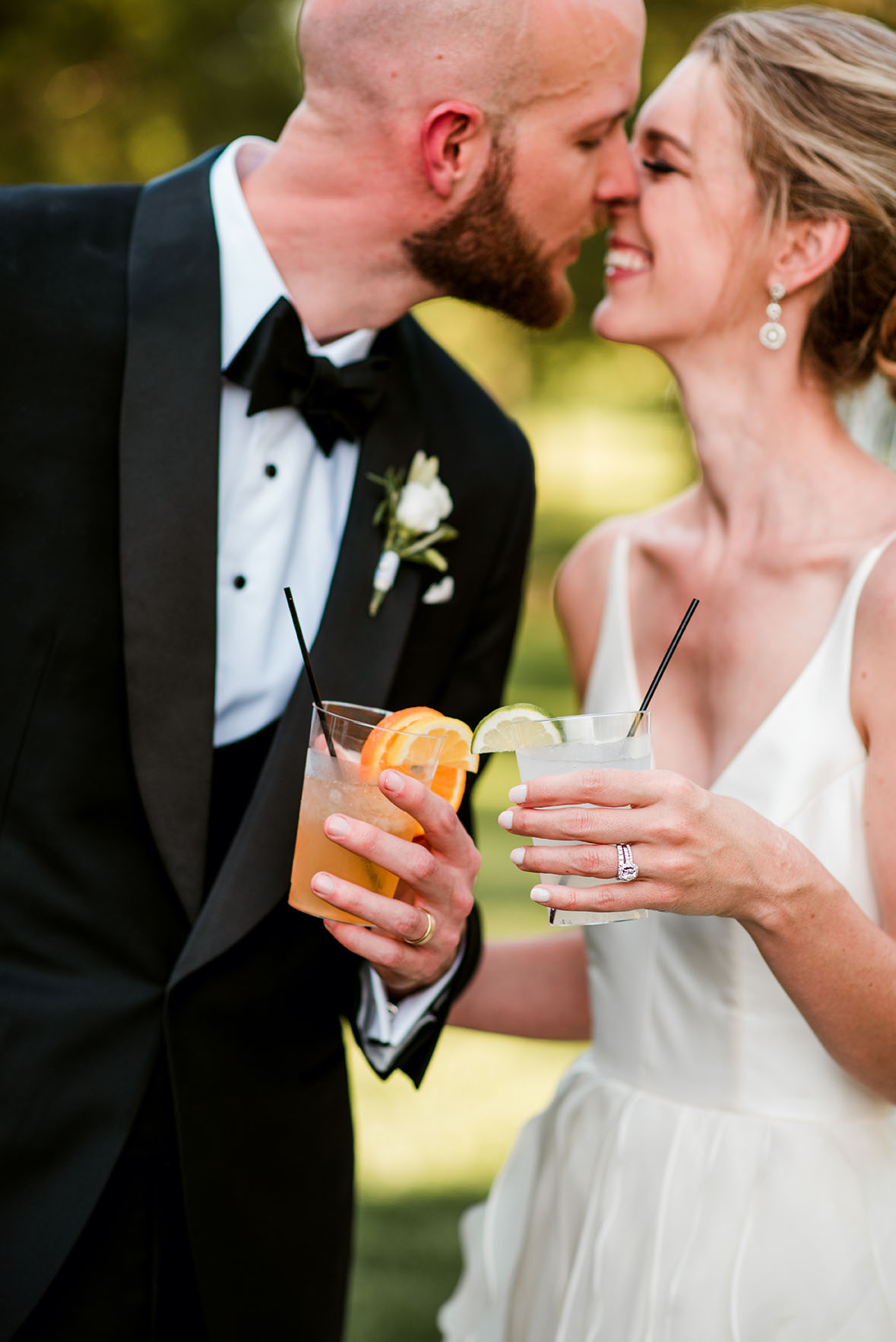 Bride and Groom Holding Signature Cocktails