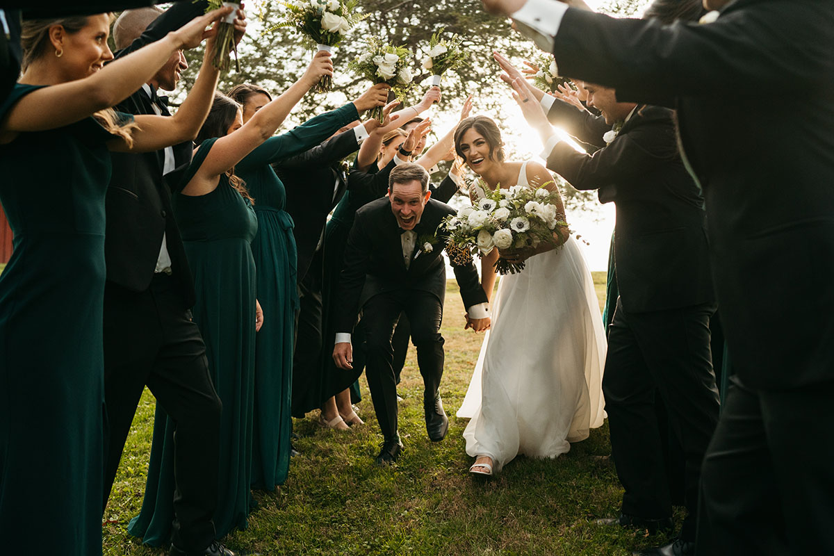 bride and groom with wedding party