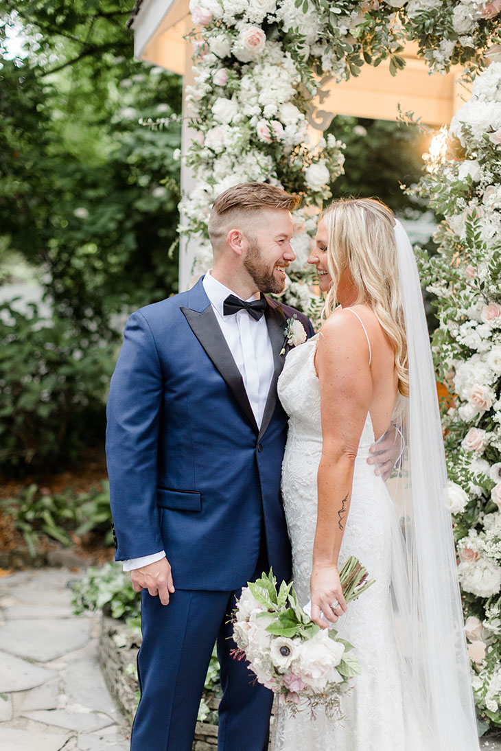 bride and groom smiling