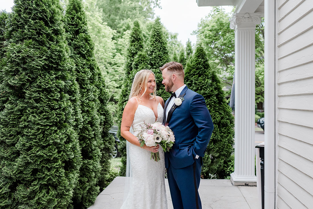 bride and groom smiling