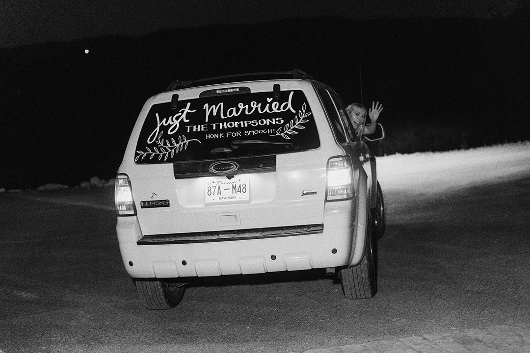 wedding exit car