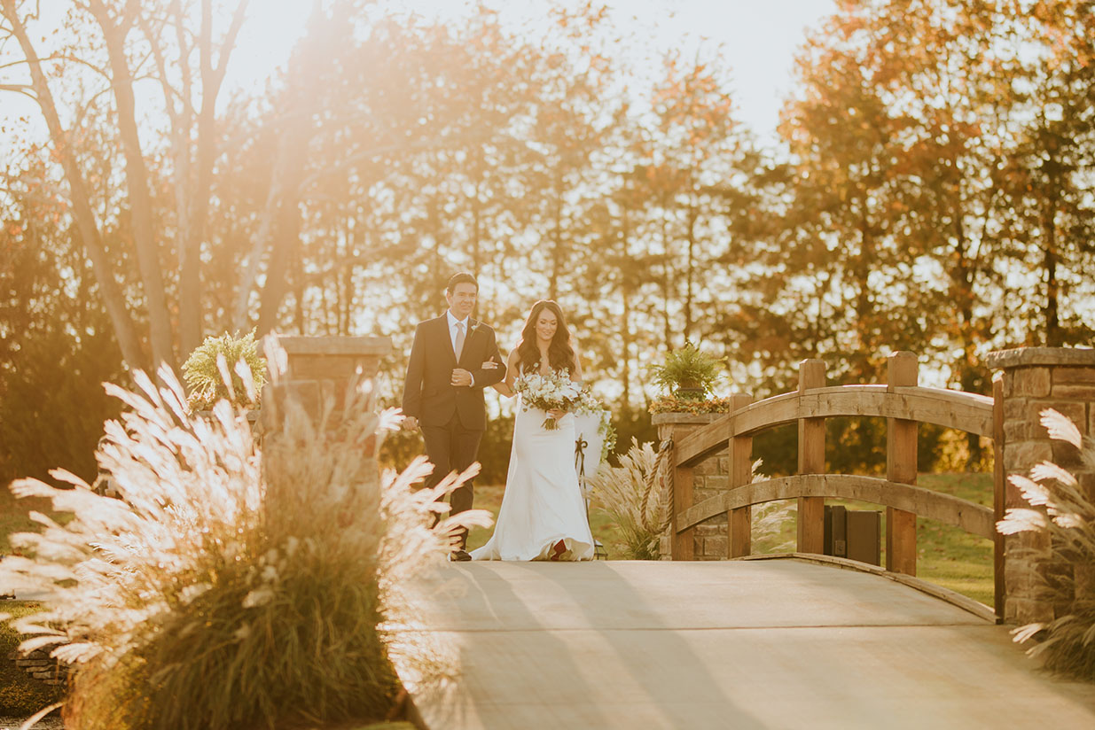 bride and father walking down asile