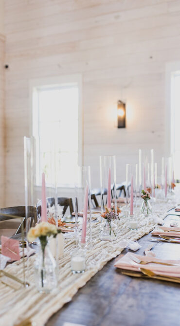 wedding reception setup with pink candles