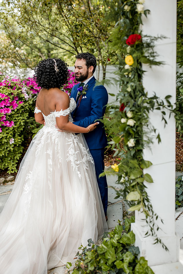 bride wearing off the shoulder open back lace wedding dress | bride and groom portraits