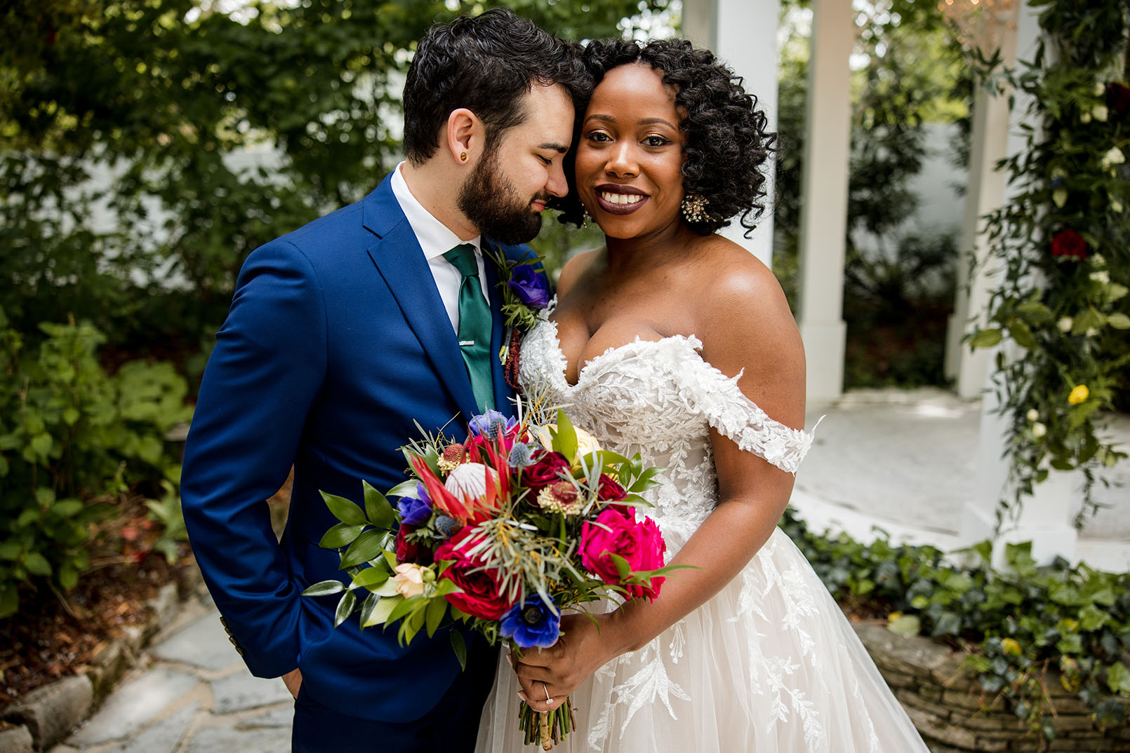 bride and groom portraits | bride wearing off the shoulder lace wedding dress