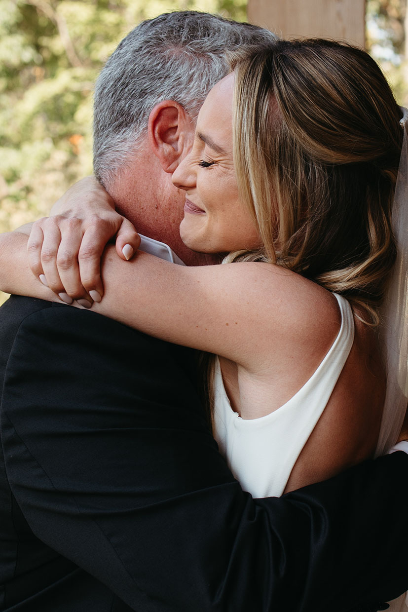 father-daughter first look hug