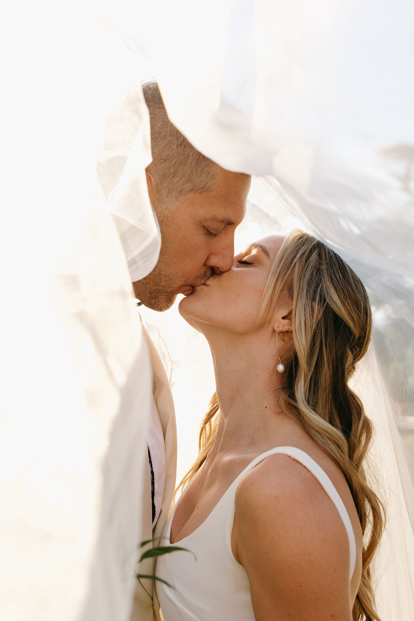 bride and groom kissing