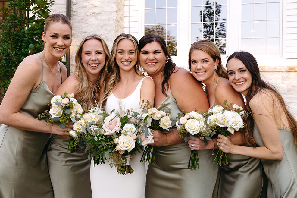 bride and bridesmaids in sage dress dresses