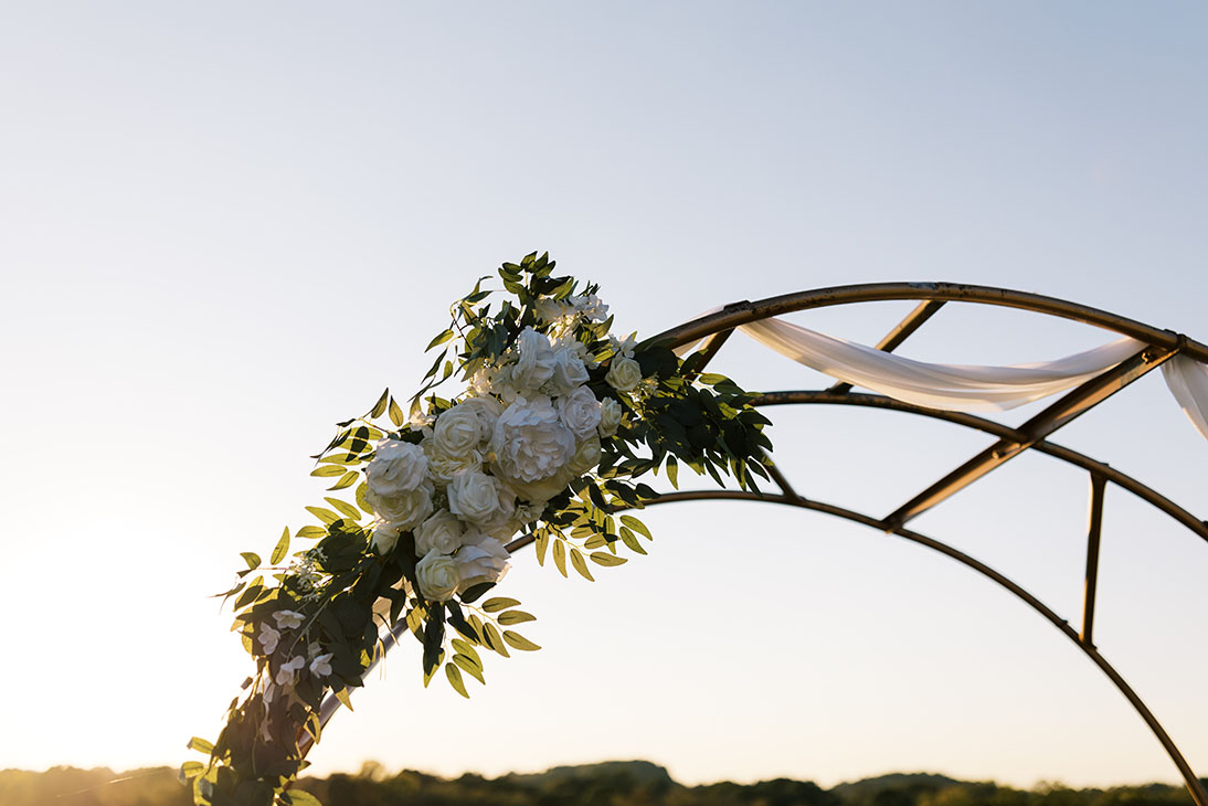 outdoor ceremony arch with florals at allenbrooke farms in spring hill, tennessee