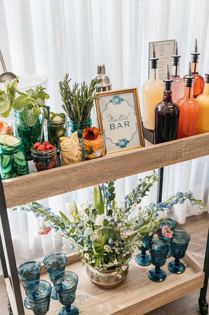 mocktail bar with assorted juices and garnishes