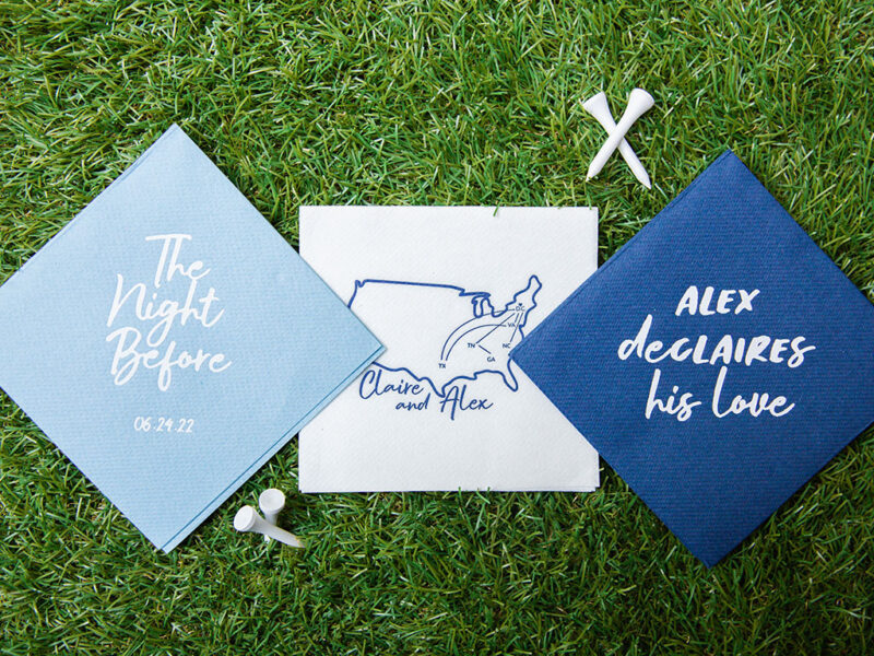 Blue golf-themed rehearsal dinner cocktails napkins