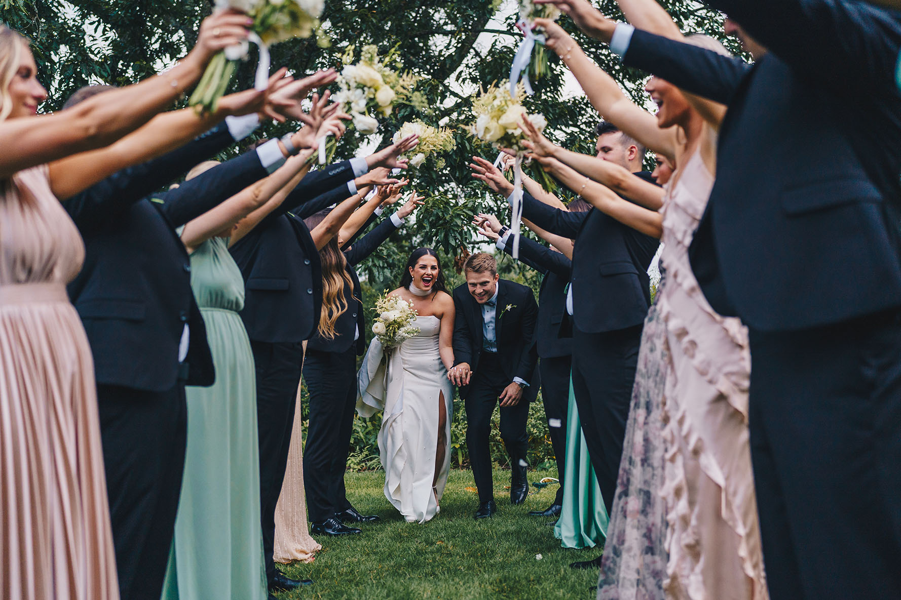 Sheridan and Jordan surrounded by their wedding party.