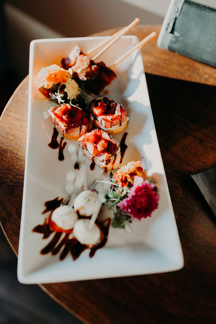 Assorted appetizers on a white plate